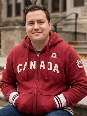 Roots Canada Red Zip-Up Hoodie with Embroidered Beaver Flag Patch UNISEX